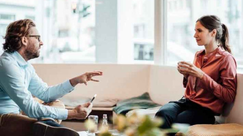 Soft skill coaching session between mentor and client focused on career growth and communication.